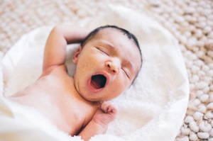 Newborn yawning &amp; strecthing - tired
